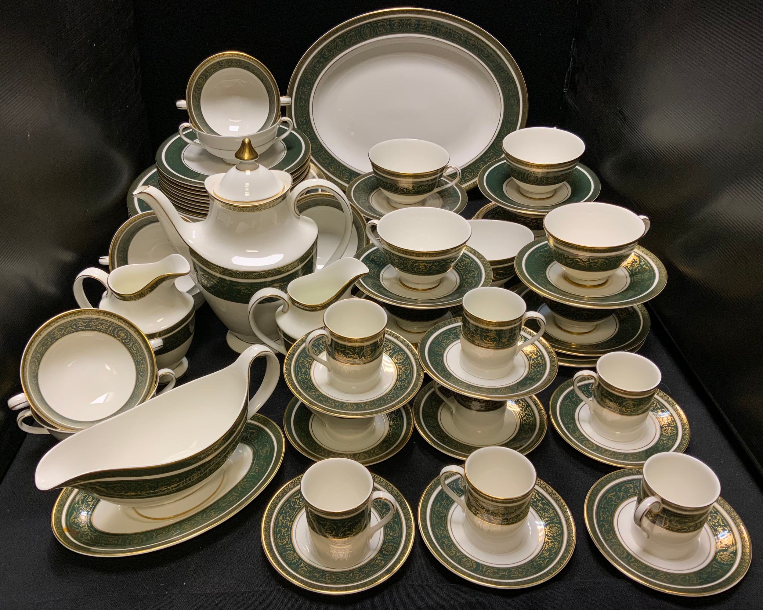 An extensive Royal Doulton Vanborough pattern table service for eight inc dinner plates, side plates
