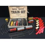 A Louis Marx and Company train set, boxed; a tin plate train set; etc