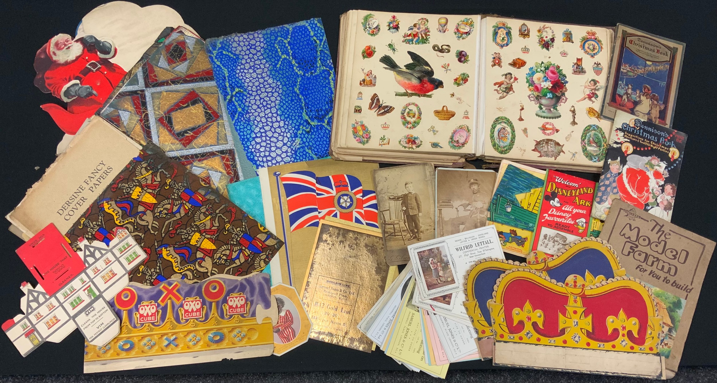 A Victorian scrap book, with some unused scraps; a folio of 1920's 'fancy papers', and sample