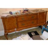 An early 20th century walnut sideboard, slightly serpentine, cabriole legs, shells to knees, 152cm