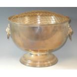 A 19th century style E.P.N.S. hemi-spherical rose bowl, everted rim, loose ring lion mask handles,