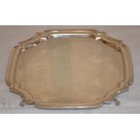 A silver George III style shaped square tray, shaped rim, scroll feet, 27cm wide, Martin, Hall & Co,