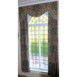 A pair of 'Mediaeval' print cotton curtains and pelmet, approx 260cm drop, 170cm wide