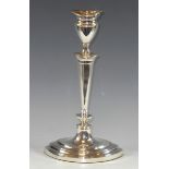 A silver Neo-Classical style candle stick of navette shape, detachable nozzle, vasular sconce,