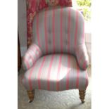 A Victorian nursing chair, striped upholstery, turned mahogany legs, c.1870