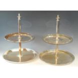 A pair of Elkington & Co EPNS cake stands, the graduated circular tiers with cylindrical column