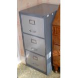 A three drawer metal filing cabinet, 100cm high, 47cm wide