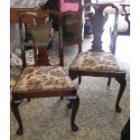 A set of ten Queen Anne style walnut dining chairs, vasular splats, drop-in seats, cabriole legs,