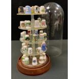 Thimbles - Royal Crown Derby, Wedgwood, Aynsley, oriental etc, with display stand.