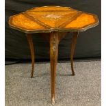 A Victorian mahogany and marquetry folding trefoil table, sabre legs, 72cm high, 64cm wide.