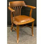 An early 20th century oak open arm chair, padded seat, H-stretcher, 80cm high.