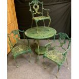 A Victorian style cast metal garden suite, comprising table and three chairs,(4)