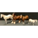A Beswick model Horse, matt colourway; others Royal Doulton, Hunter, grey, cantering Shire etc (4)
