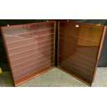 A graduated pair of wall mounting collectors display cabinets, adjustable shelves, largest 84cm x