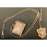 A graduated link silver Albert chain suspending a late Victorian silver vesta case, shield fob, 2.