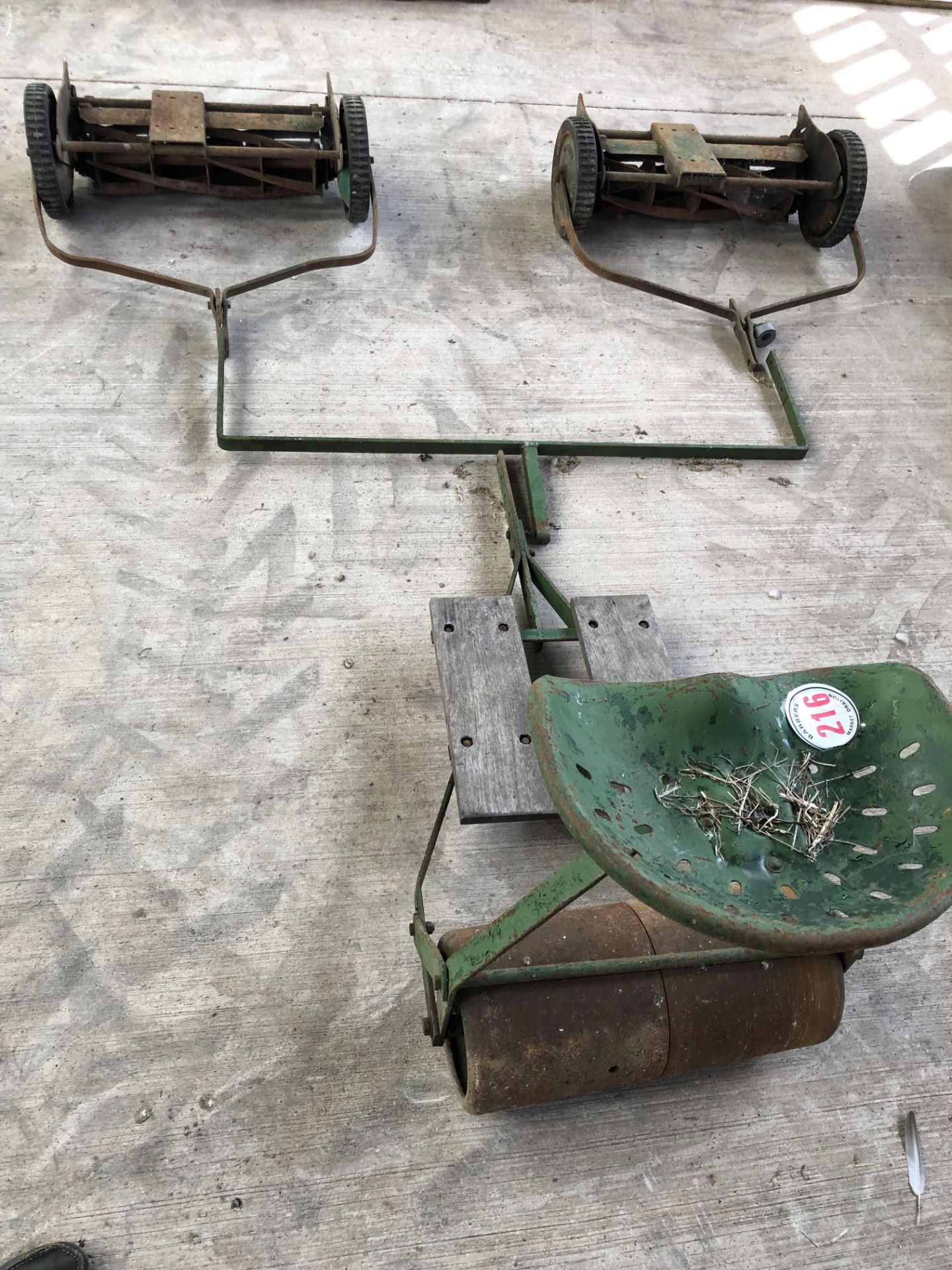 Roller seat and two mower attachments