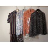 A collection of vintage shirts/blouses to include Rodier Paris size 12 skirt and blouse combo, 3 x