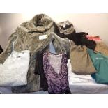 A collection of clothes to include a next faux fur coat, Laura Ashley top etc..sizes 10 - 14