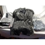 A real leather jacket and 2 new pairs of jeans size 32W 32L