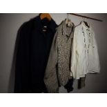 2 Jackets and a white shirt with black stitching detail