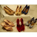 A collection of 6 pairs of shoes sizes 5 -7