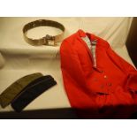 A collection of items to include a red 'ring masters' style tailed jacket 2 x 1980's German caps and