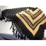 2 Chunky knit items - a black shawl and poncho
