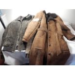 A blue Harbour Jacket and belted sheepskin coat