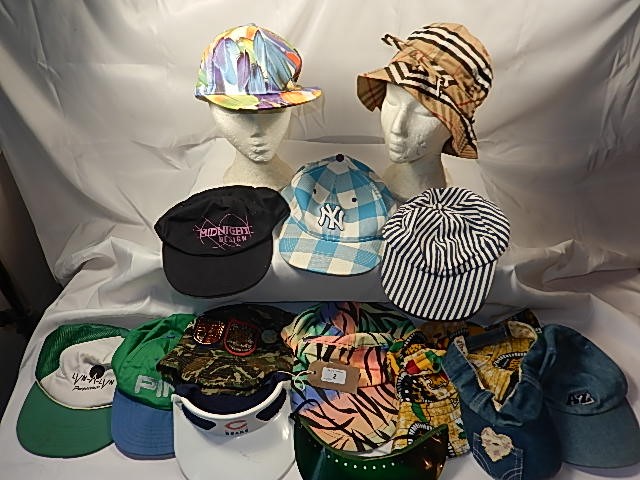 A collection of 14 Bucket style hats, baseball caps and visors- to include Burberry 'style' hat