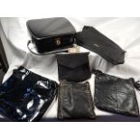 6 Black bags to include a Black patent vanity case and Next bag