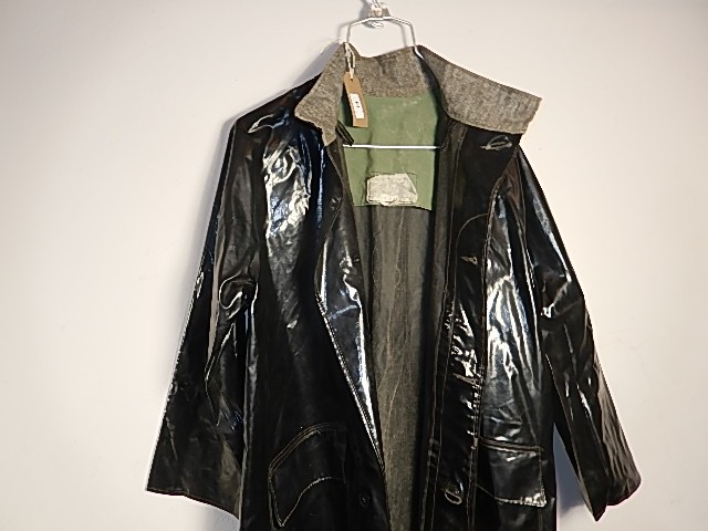 A black rain coat C. 1970's? labels unreadable, small tear in left arm. - Image 4 of 4