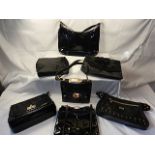 A collection of 7 Black bags to include - Next and Vintage St Michael (some leather)