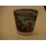 A Moustache Cup depicting Scarborough from the spa grounds