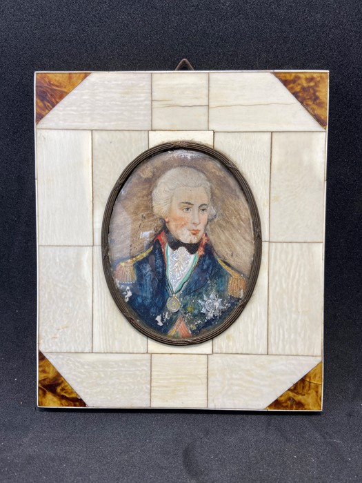 Watercolour portrait of Lord Nelson in small oval bone and tortoise shell frame 7cm x 9cm opening,