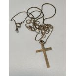 two silver chains with crucifix