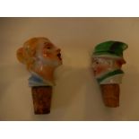 2 German 1930's porcelain lady and man head cork pourer bottle stoppers both 8cm tall approx.