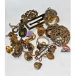 a collection of costume jewellery that includes a silver ring