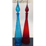 A pair of tall decorative glass bottles with stoppers, tallest 68cm tall