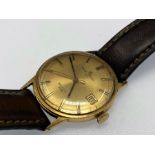 A vintage 18ct gold Baume & Mercier of Geneve Baumatic 17 jewels wristwatch numbered 443500 35116