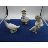 Lladro girl angel blowing trumpet, NAO seated girl cuddling puppy, NAO daisa goose all great