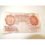 A Brown/red 10 Shilling note - O'Brien -W17Y 480481 Creased dated from (1955 - 1962 ) Has metal