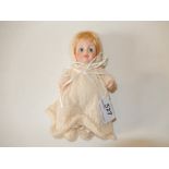 A vintage 'Effanbee' porcelain doll with movable arms, legs and head 7inches