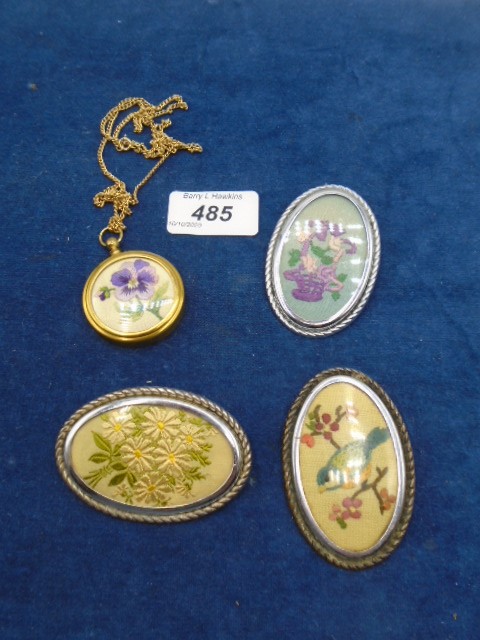 3 embroidered brooches and 1 embroidered necklace