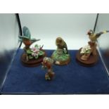 4 Bird Figurines tallest 8 inches