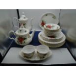 Royal Albert Poinsetta; 9 saucers, 5 side plates, cake plate, 6 dinner plates and dish plus