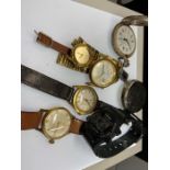 A collection of watches to include: a white metal Maty pocket watch; Smith's deluxe wristwatch