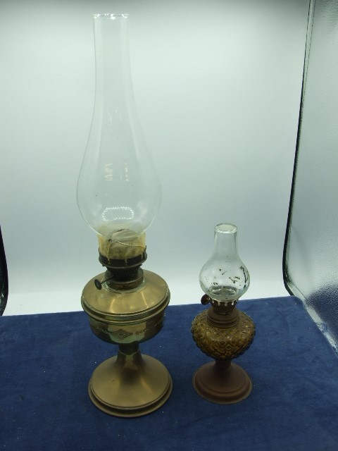 2 Oil Lamps ( glass cracked on largest one)