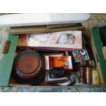 Box of assorted items- placemats and coasters, boxed doll, salters scales, 3 x needlework pictures