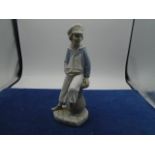Lladro sailor boy holding toy yacht, good condition
