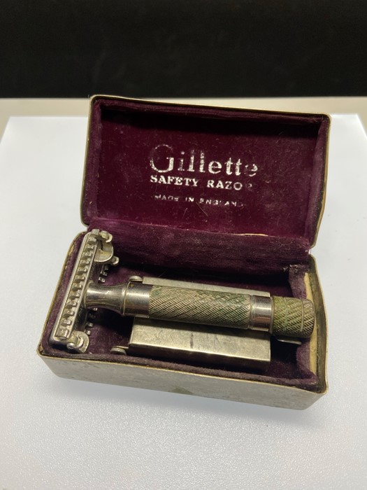 A vintage cased Gillette Safety Razor in metal box